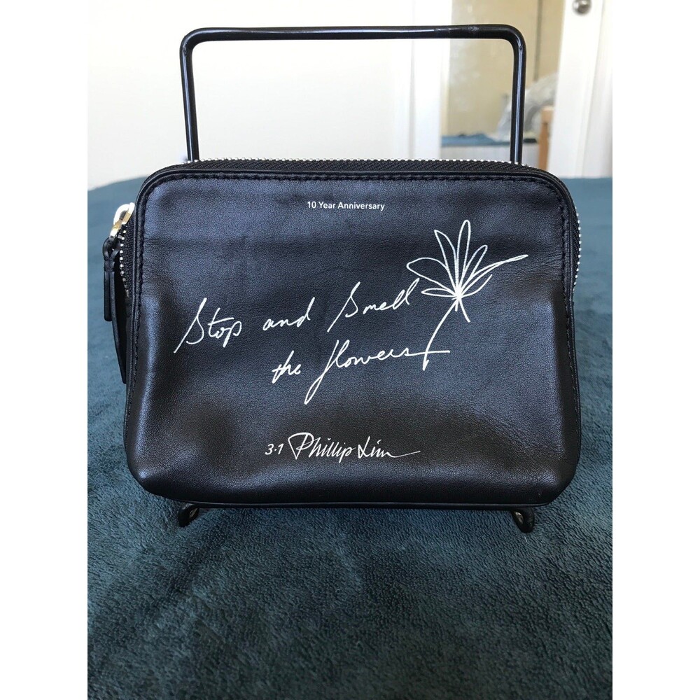 3.1 Phillip Lim 10th anniversary stop and smell the flower cosmetic pouch